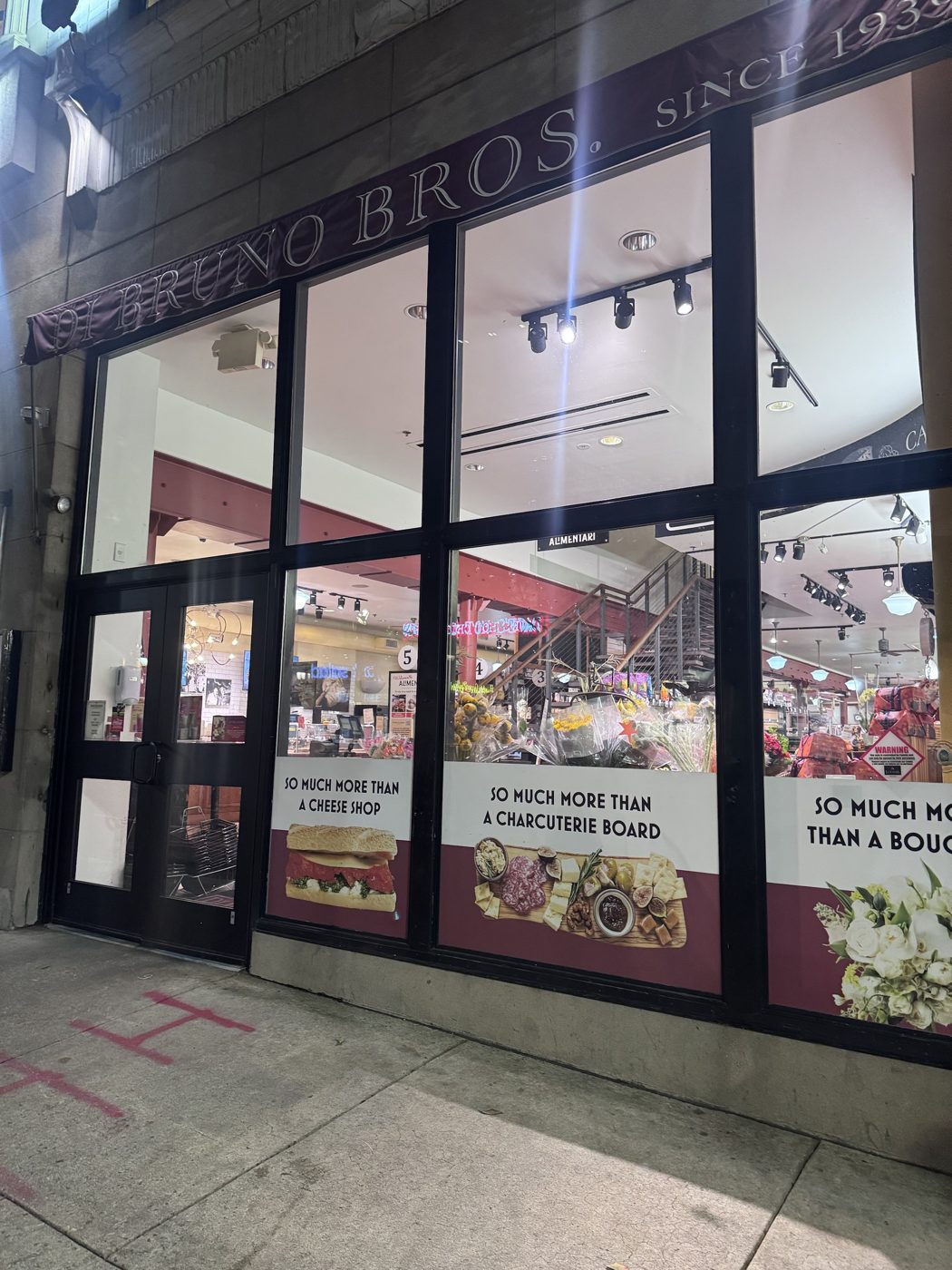 Di Bruno Bros. storefront on Chestnut Street at night