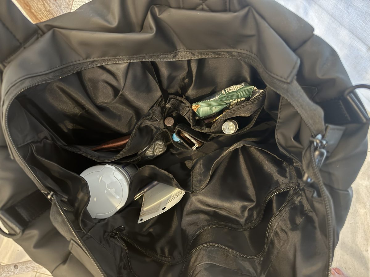 Inside the Heys Puffer Travel Tote, showing the interior pockets